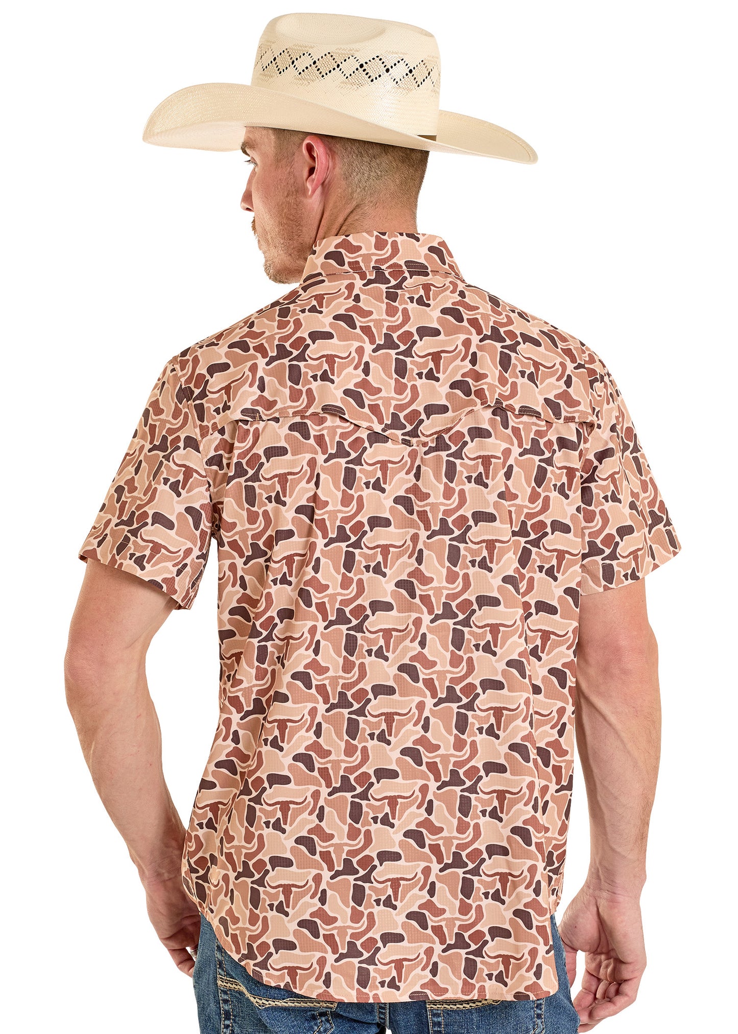 Man wearing a patterned shirt and cowboy hat on a white background