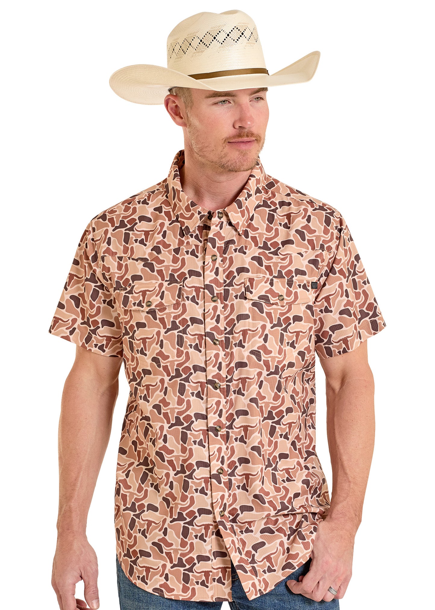Man wearing a patterned shirt and cowboy hat on a white background