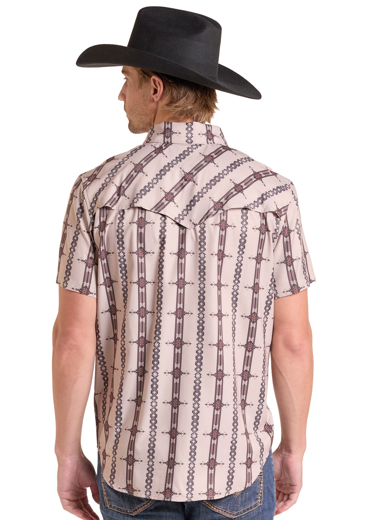 A man wearing a short-sleeve western shirt with a brown and beige chain-link pattern, paired with a black cowboy hat and blue jeans, shown from the back against a white background.