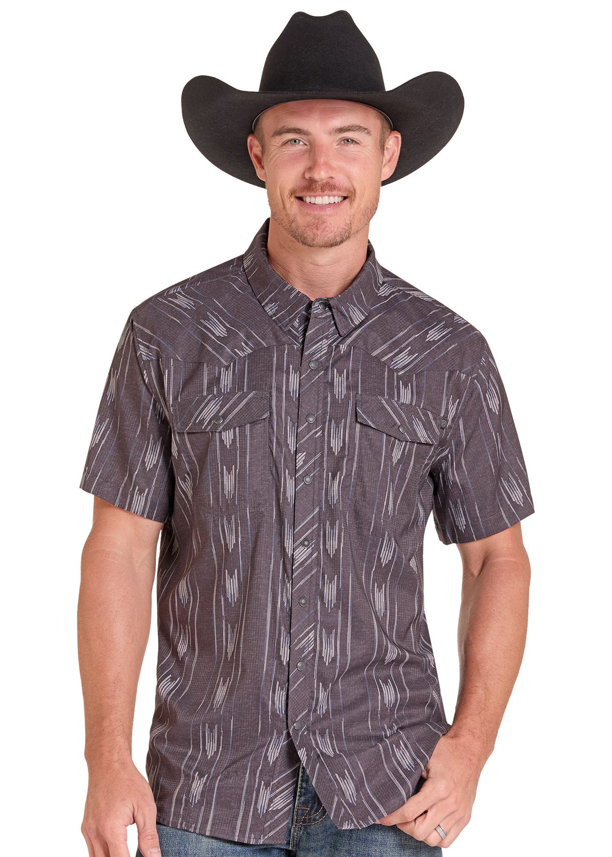 A man wearing a dark gray short-sleeve western button-up shirt with a subtle vertical pattern, paired with a black cowboy hat and blue jeans, photographed against a solid white background.