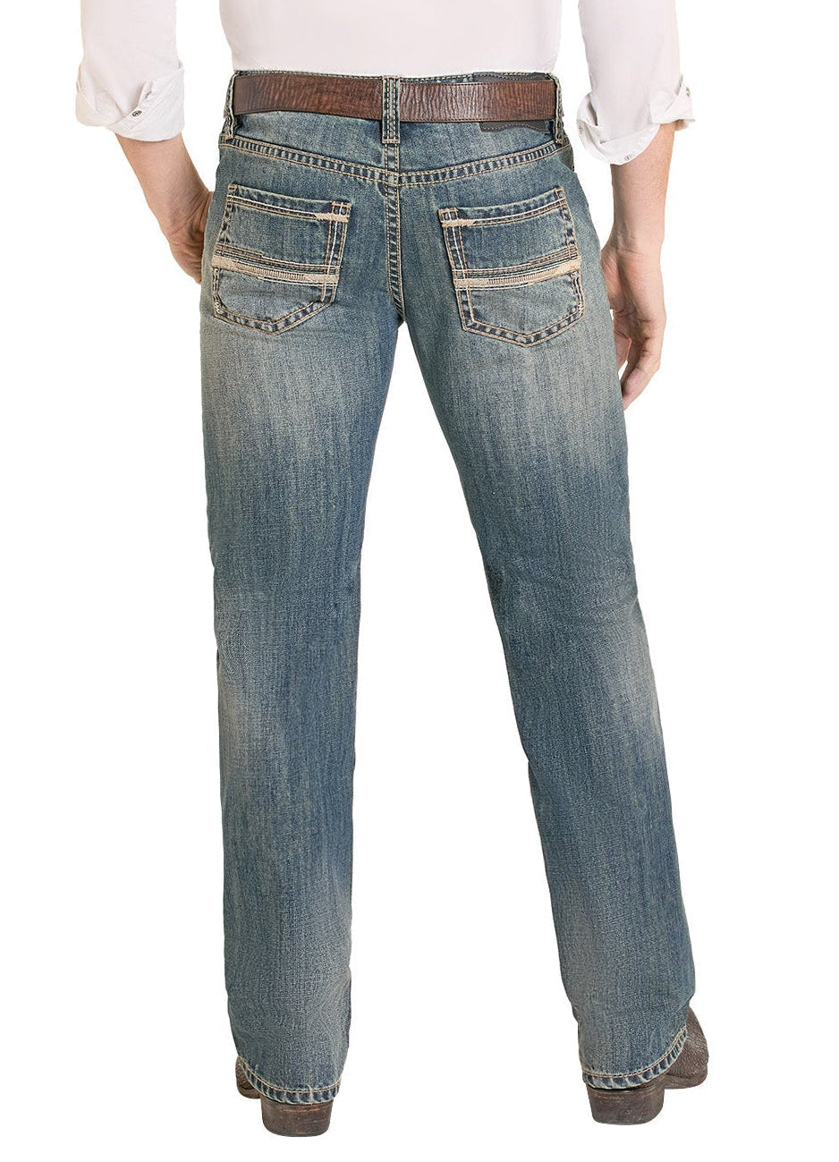 Man wearing a white shirt, blue jeans, and a beige cowboy hat on a white background