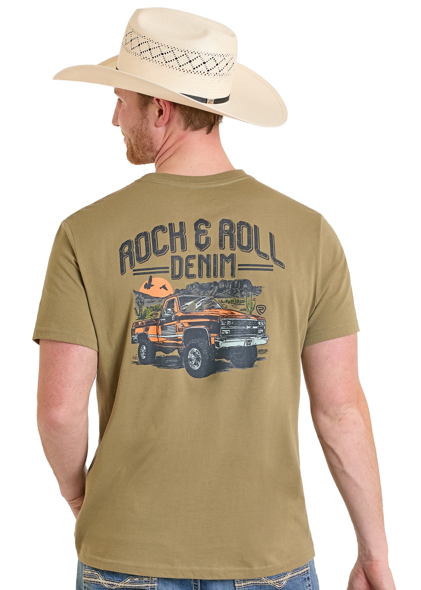 Man wearing a tan cowboy hat and a green t-shirt with a graphic design and text.