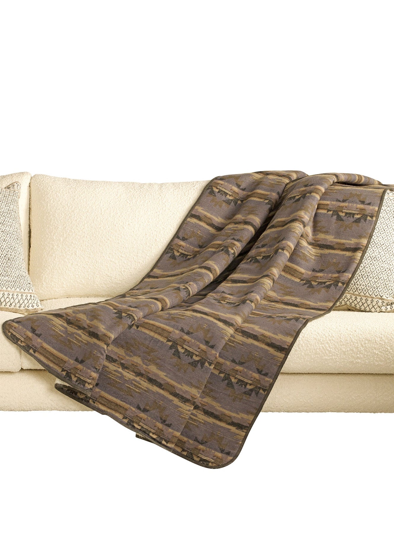 Brown textured throw blanket on a beige couch