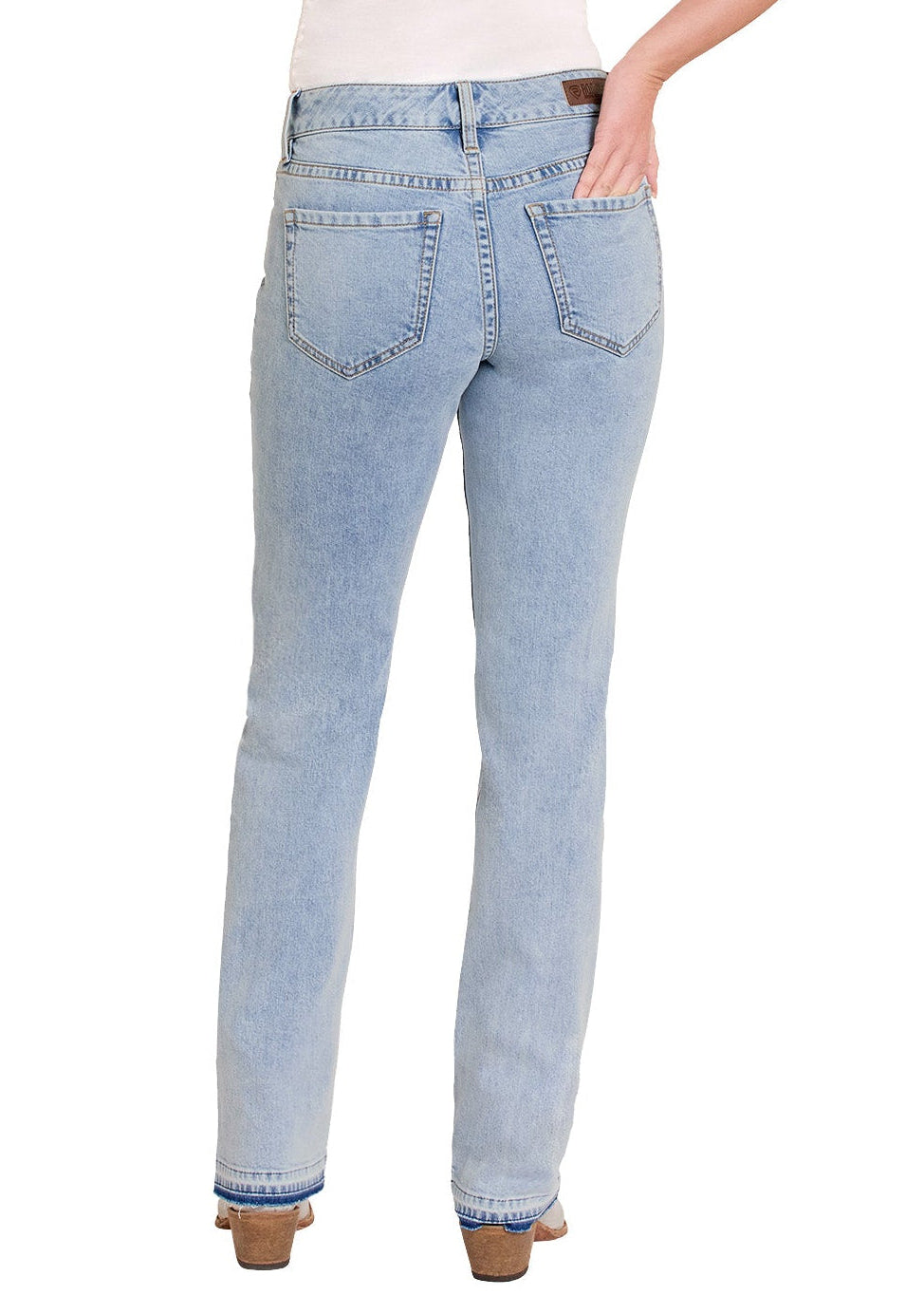 Woman wearing light blue jeans and a white top with a straw hat on a white background