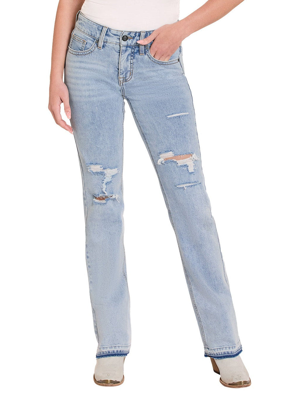 Woman wearing light blue jeans and a white top with a cowboy hat on a white background