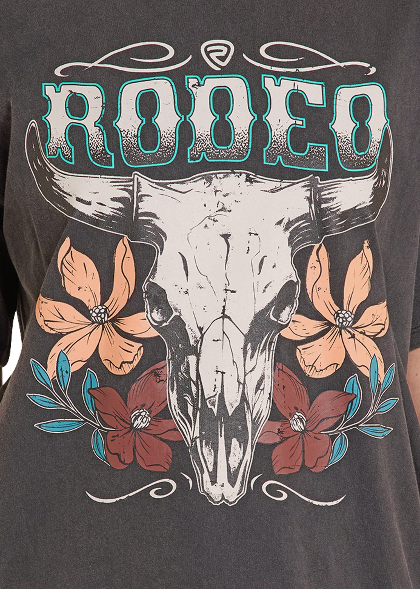 T-shirt with a bull skull design and floral elements on a dark background