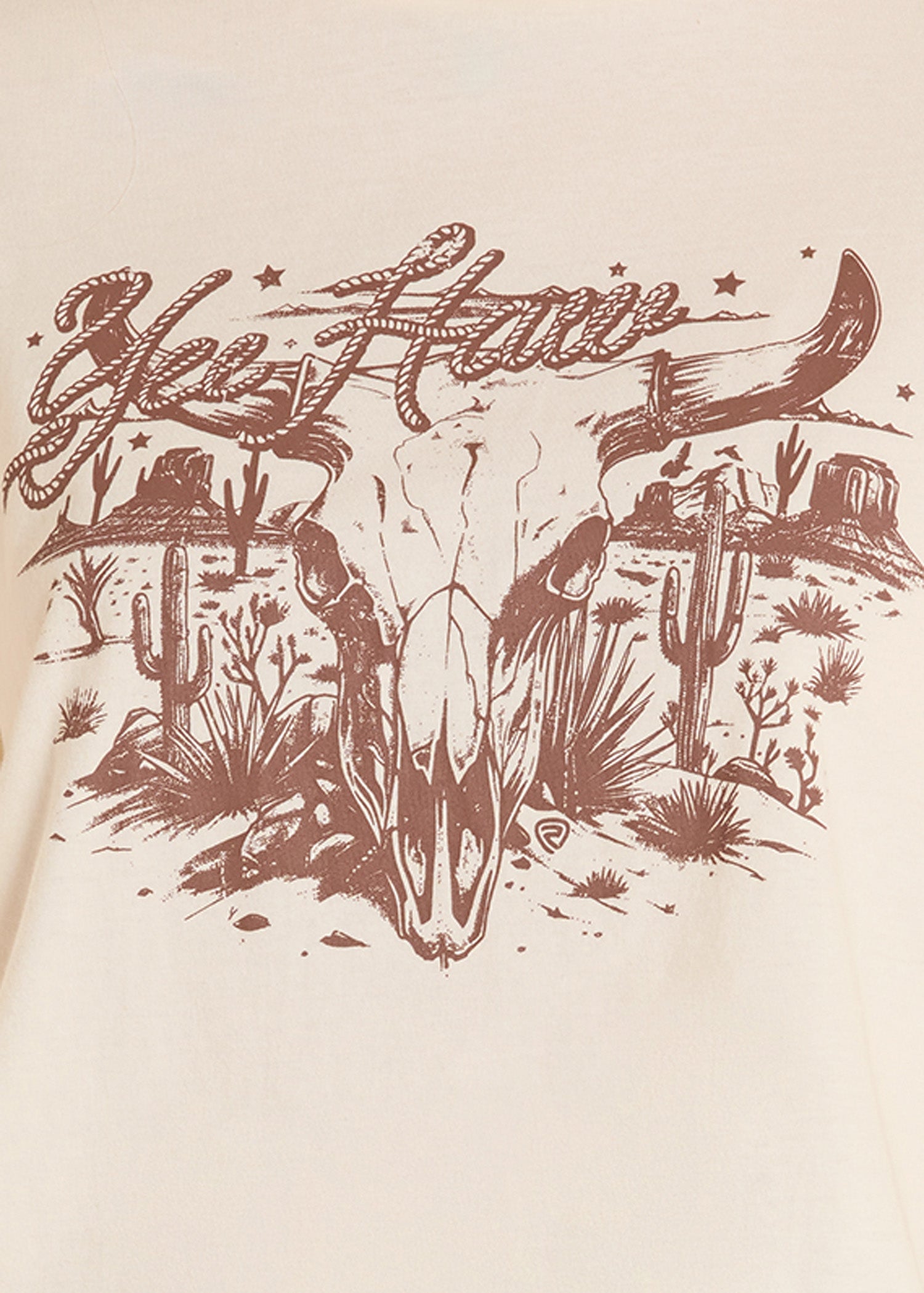 Vintage-style illustration of a cowboy hat, skull, and desert landscape with 'Yeehaw' text on a beige background.
