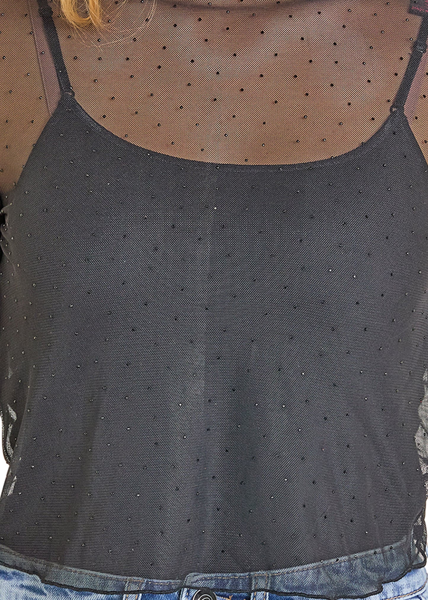 Black tank top with rhinestone embellishments worn by a person.