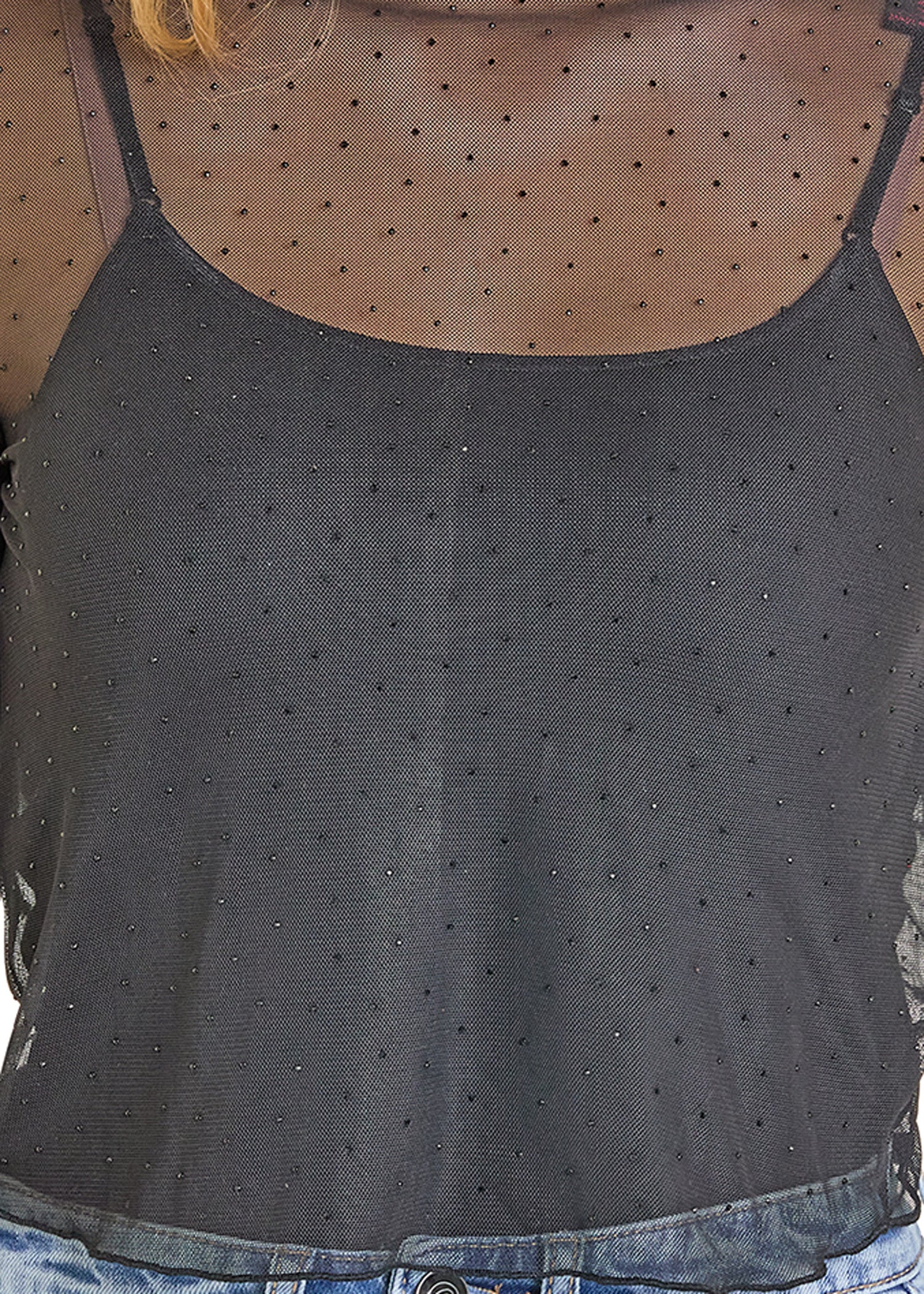 Black tank top with rhinestone embellishments worn by a person.