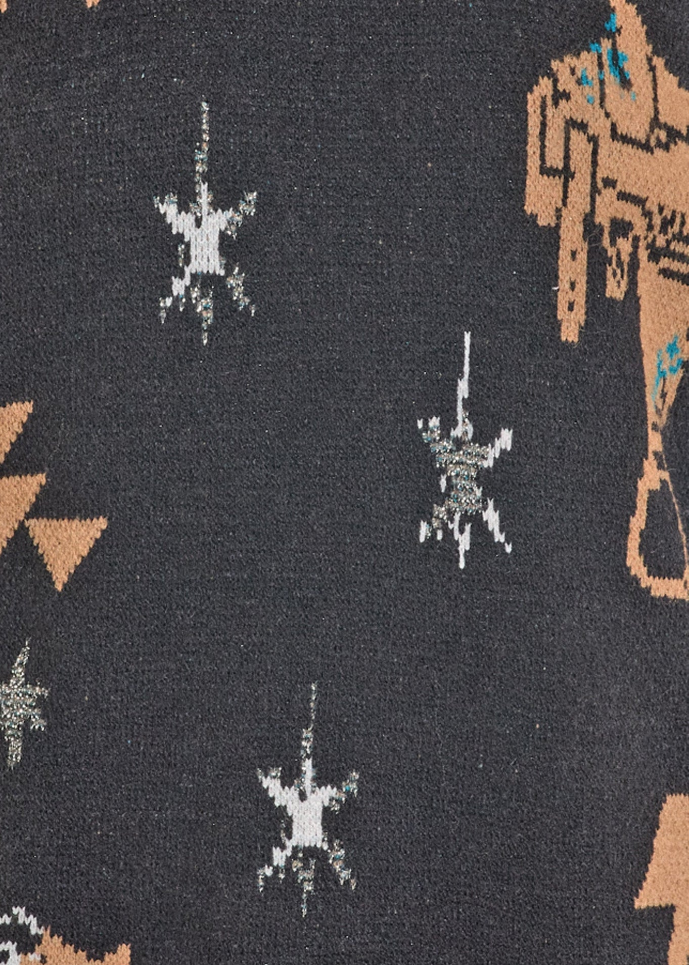 Textile with geometric pattern on a dark background