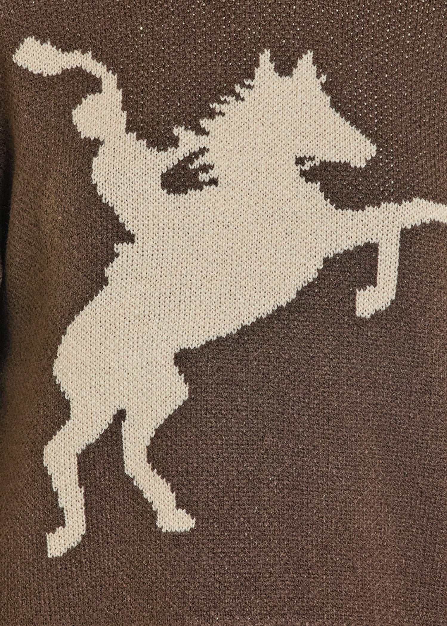 Knitted fabric with a white horse design on a brown background