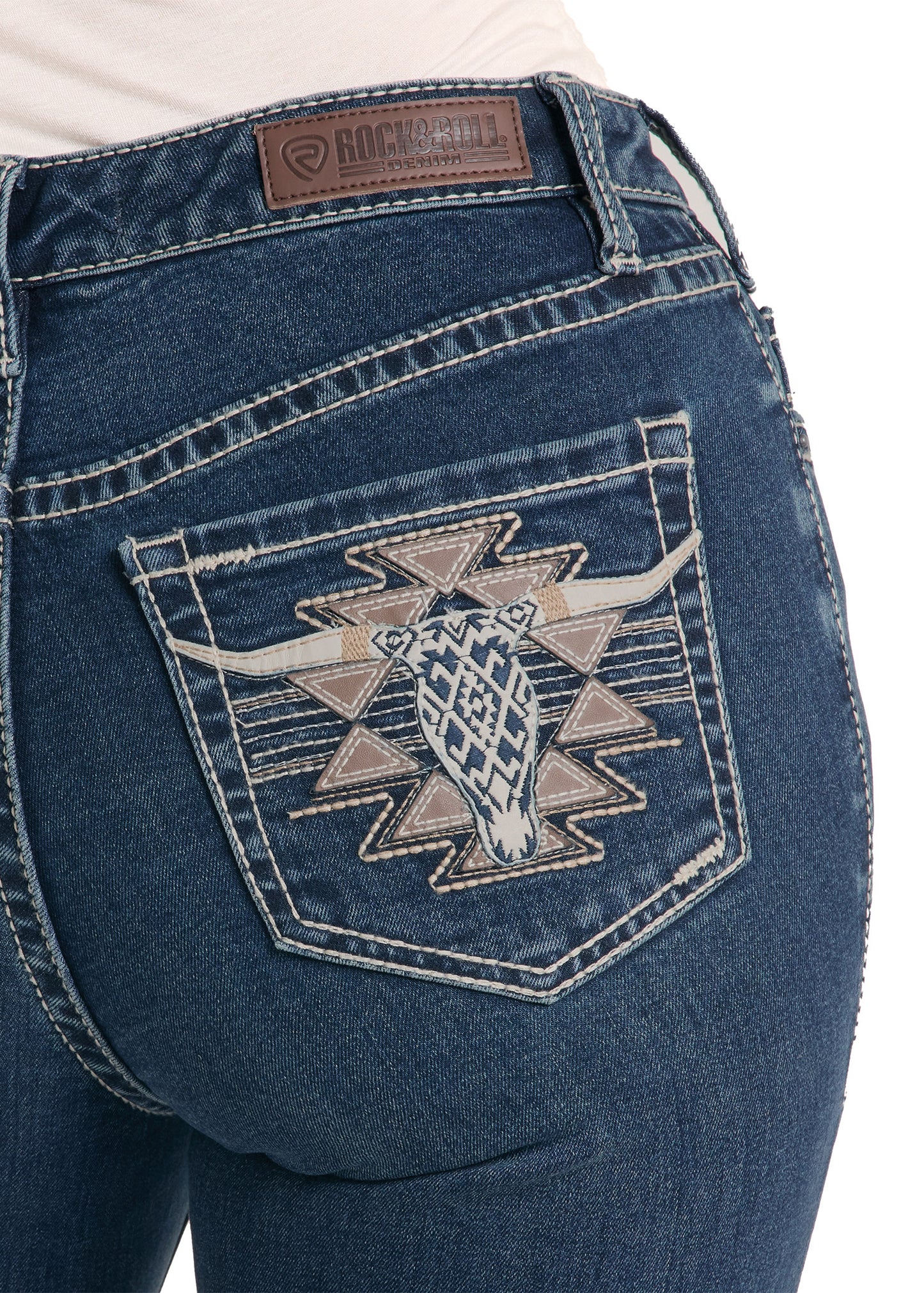 Blue jeans with a geometric pattern on the back pocket, featuring the Rock & Roll Cowboy brand.