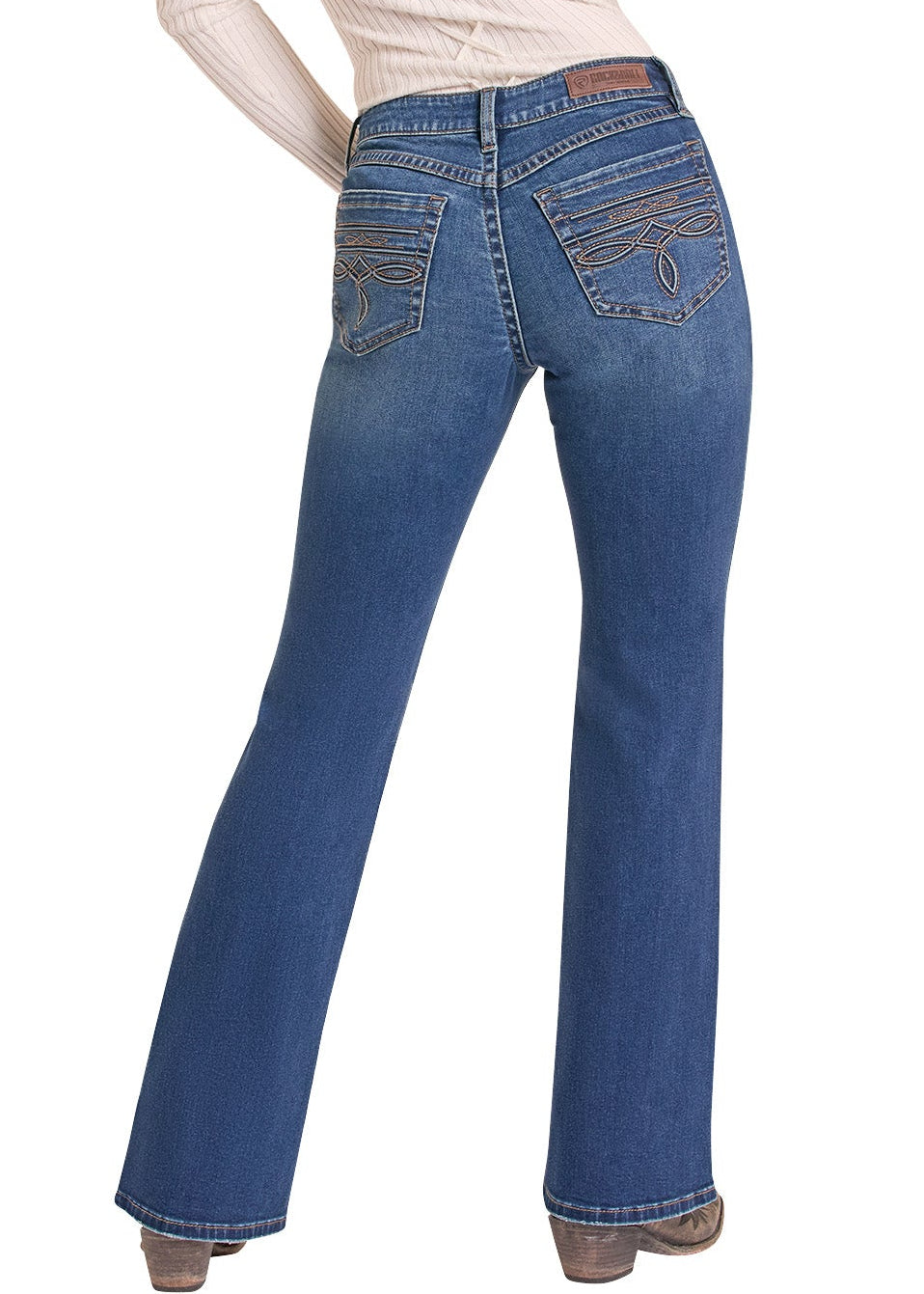 A woman shown from the back wearing blue flare jeans, a cream ribbed long-sleeve top with lace-up back detail, and a light beige cowboy hat against a white background.