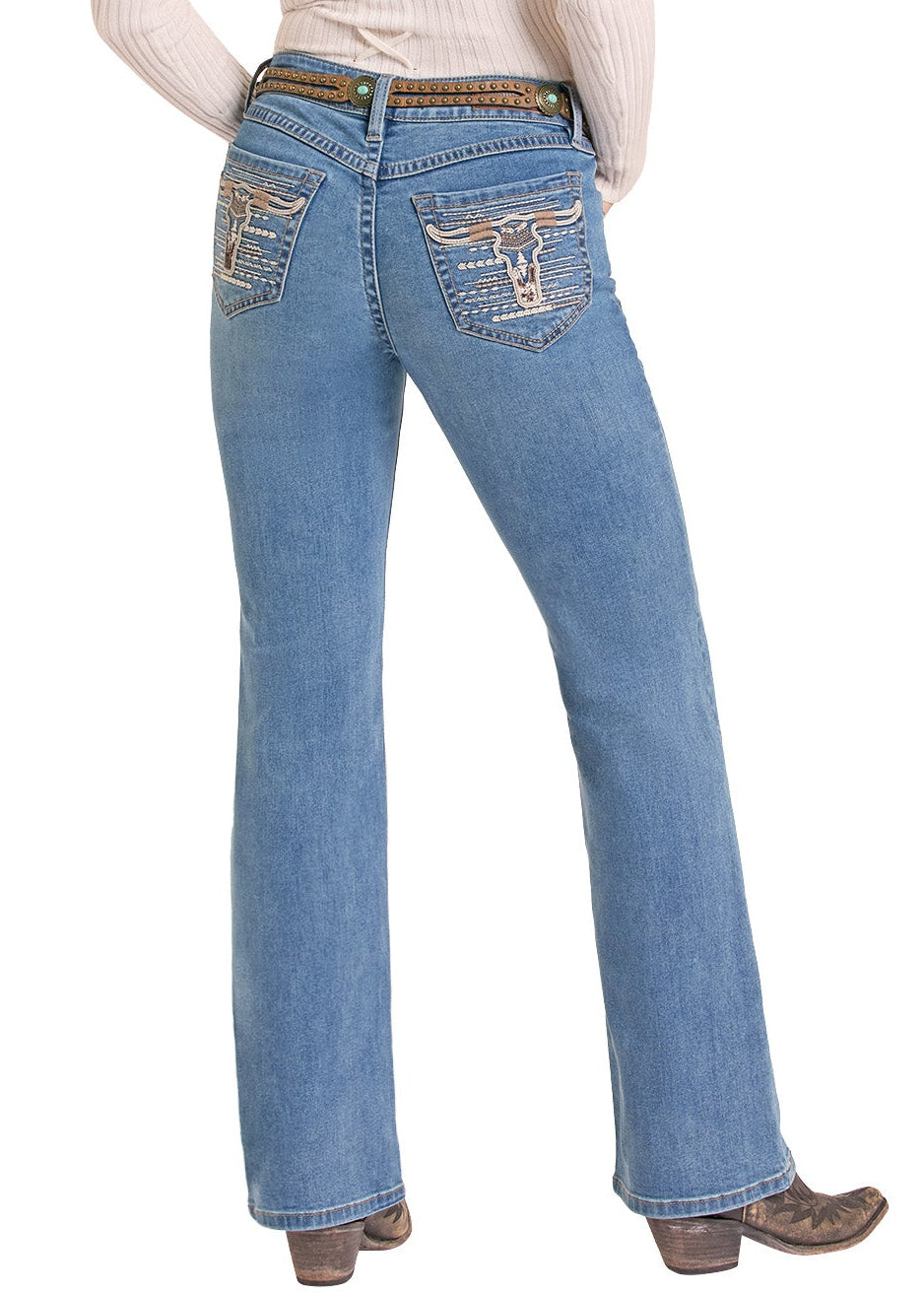 A woman shown from the back wearing a beige wide-brim hat, a cream ribbed long-sleeve top with a lace-up back, blue jeans with western embroidery on the back pockets, and brown boots, set against a plain white background.