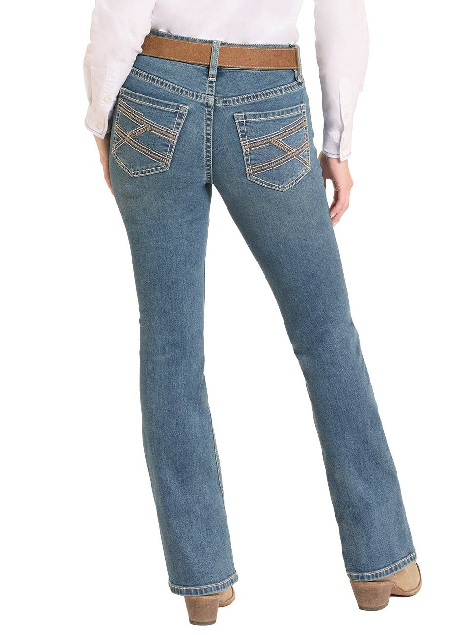 Woman wearing blue jeans and a white shirt with a beige cowboy hat on a white background