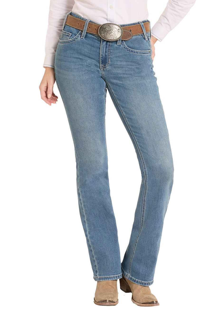 Woman wearing a white shirt, blue jeans, and a cowboy hat on a white background