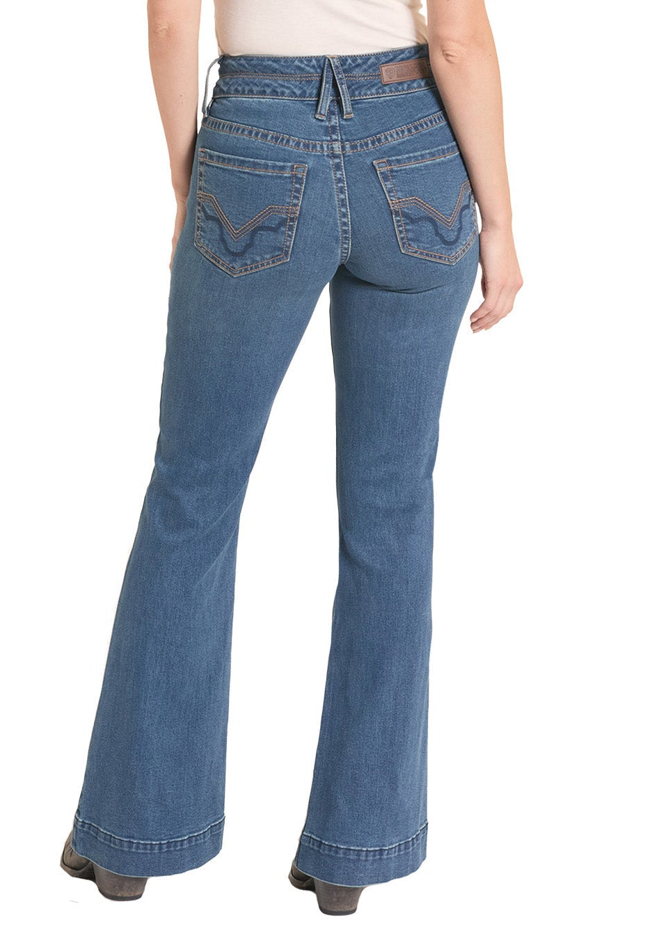 Person wearing blue jeans and a white shirt with a cowboy hat on a white background