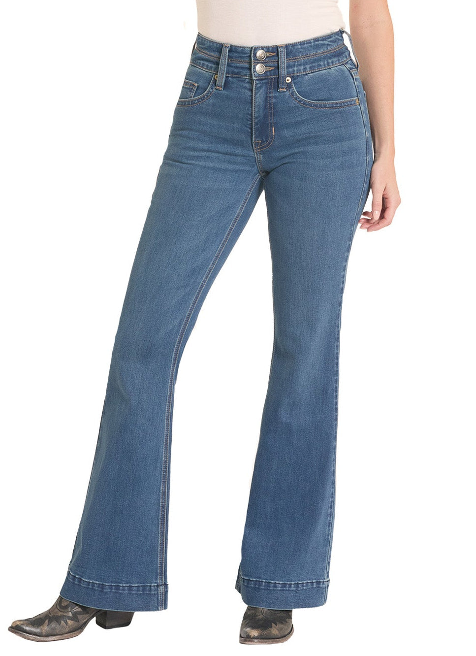 Woman wearing blue jeans and a beige hat on a white background