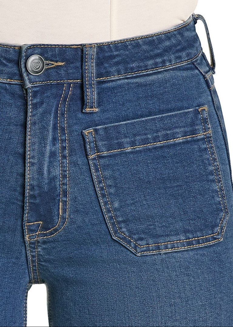 Blue jeans on a mannequin with a white background