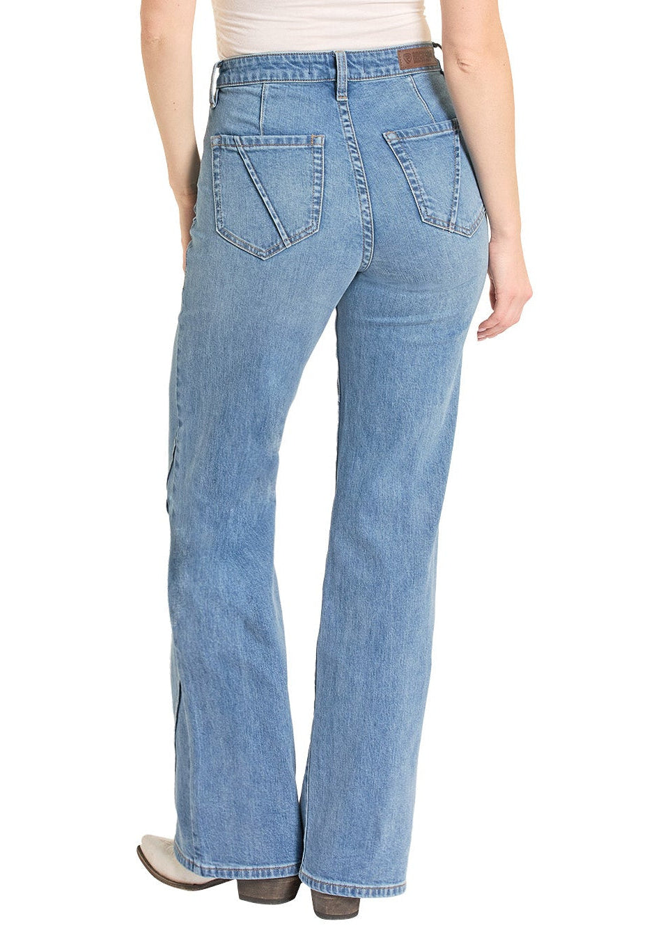 Woman wearing a white sleeveless top and blue jeans with a beige hat on a white background