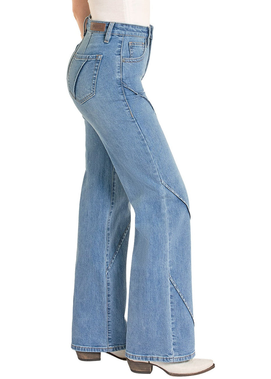 Woman wearing a white sleeveless top and blue jeans, on a white background