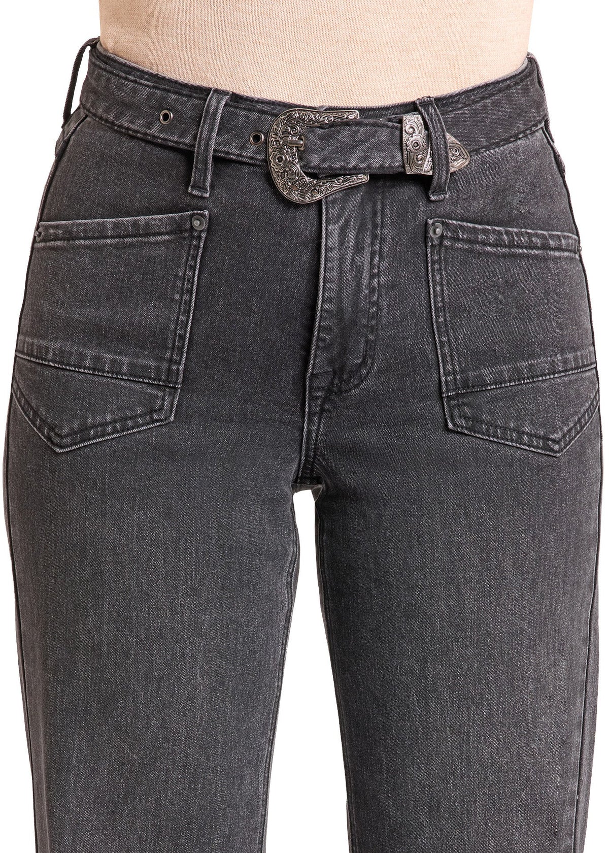 Close-up of a person wearing dark gray washed denim jeans with a western-style silver buckle belt, showing the front waistband, belt, and front pockets.