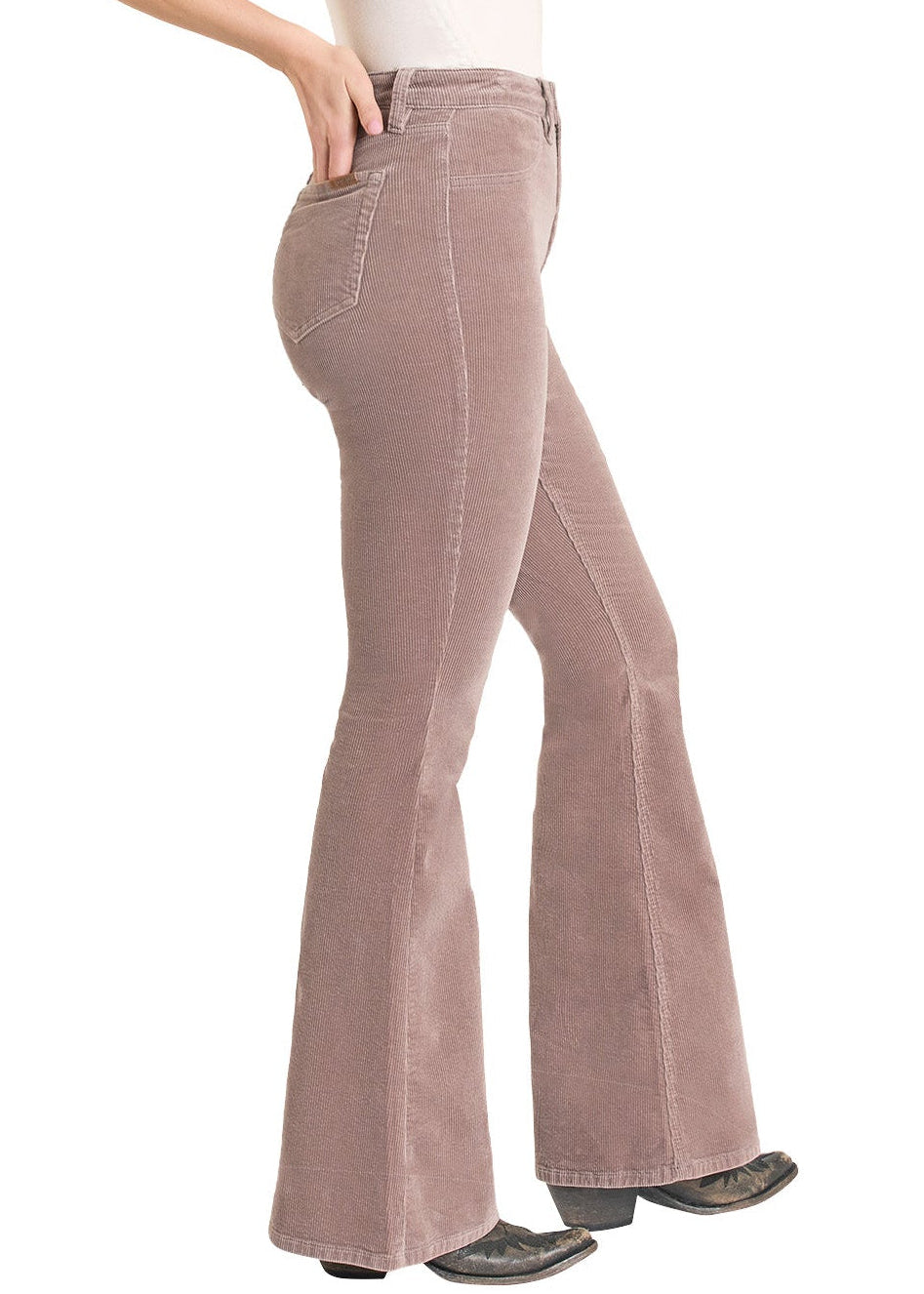 Woman wearing a white sleeveless top and brown bell-bottom pants with a cowboy hat on a white background