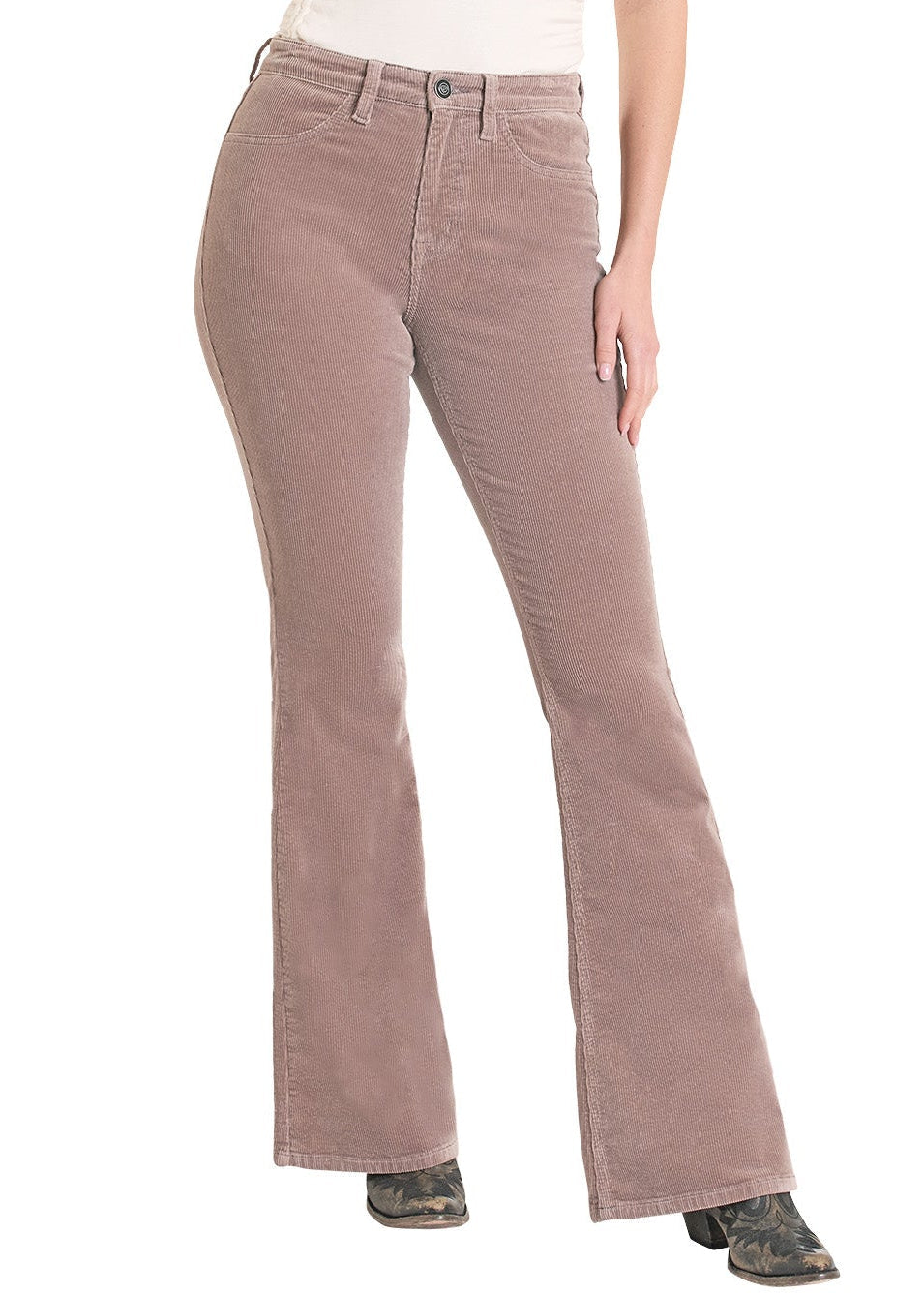 Woman wearing a white sleeveless top and brown corduroy pants with a beige hat on a white background