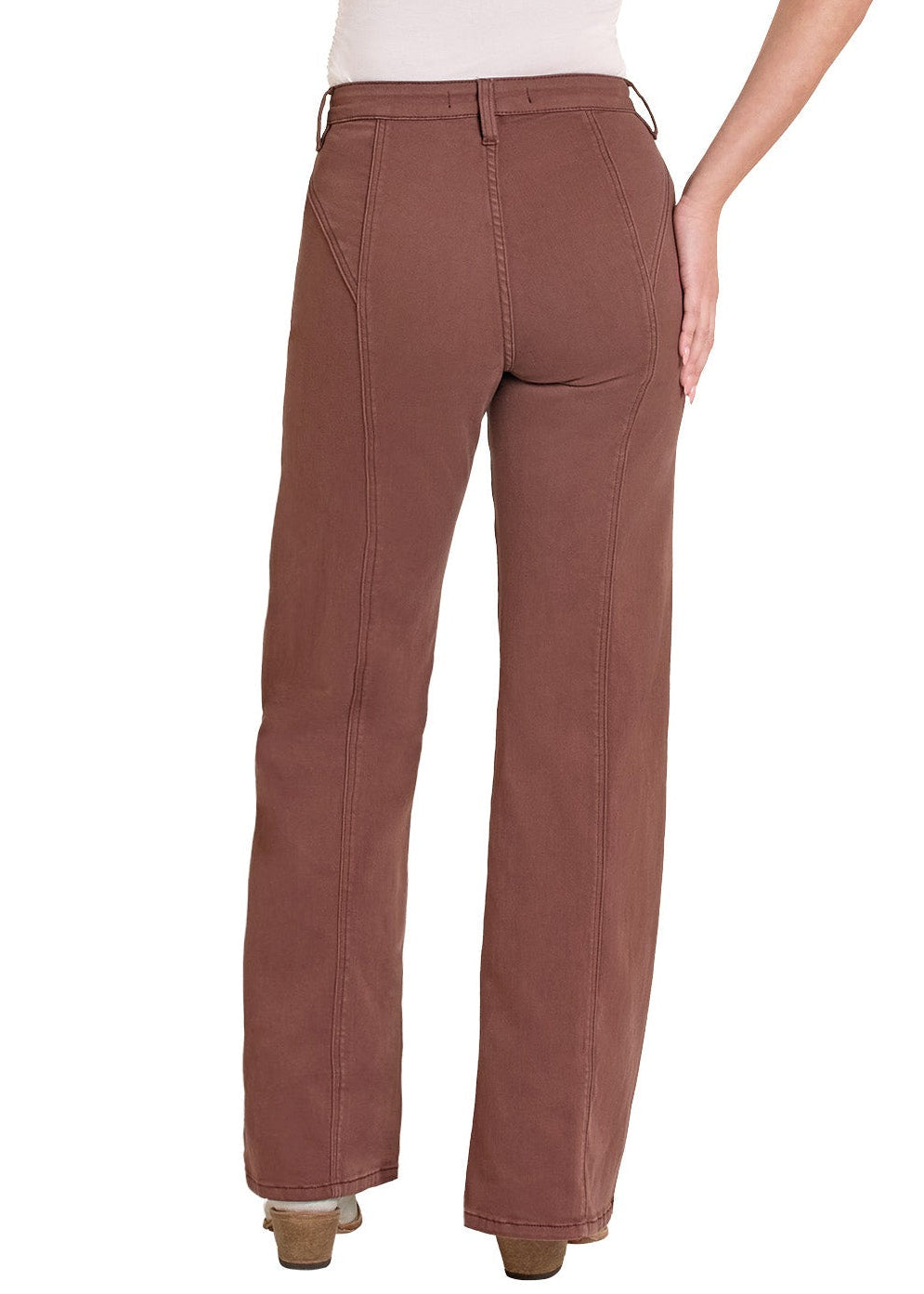 Woman wearing a white tank top and brown pants with a beige hat on a white background