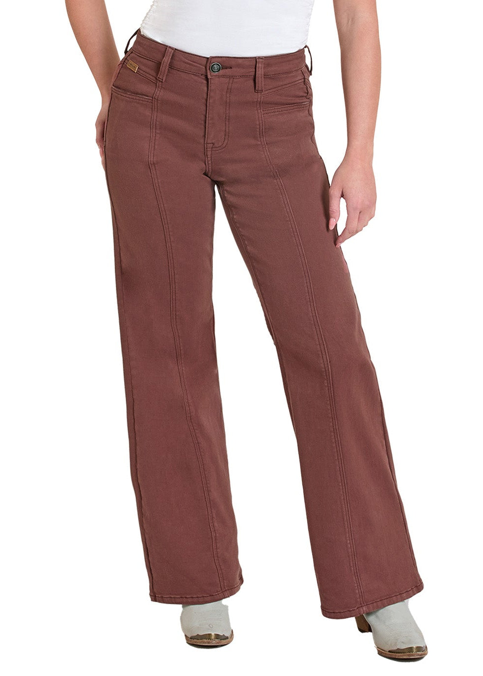 Woman wearing a white top and brown pants with a cowboy hat on a white background