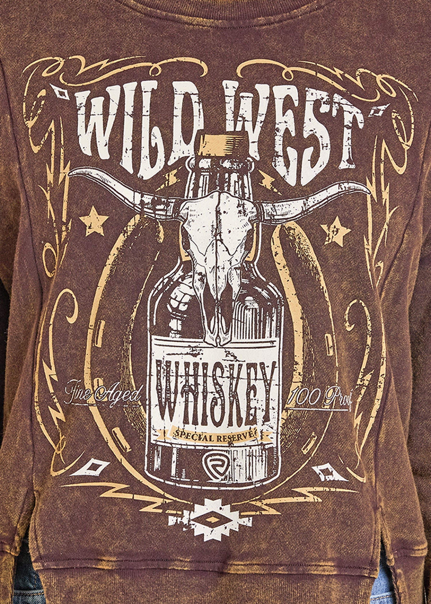 Brown sweatshirt with 'Wild West Whiskey' graphic design featuring a bottle and skull.