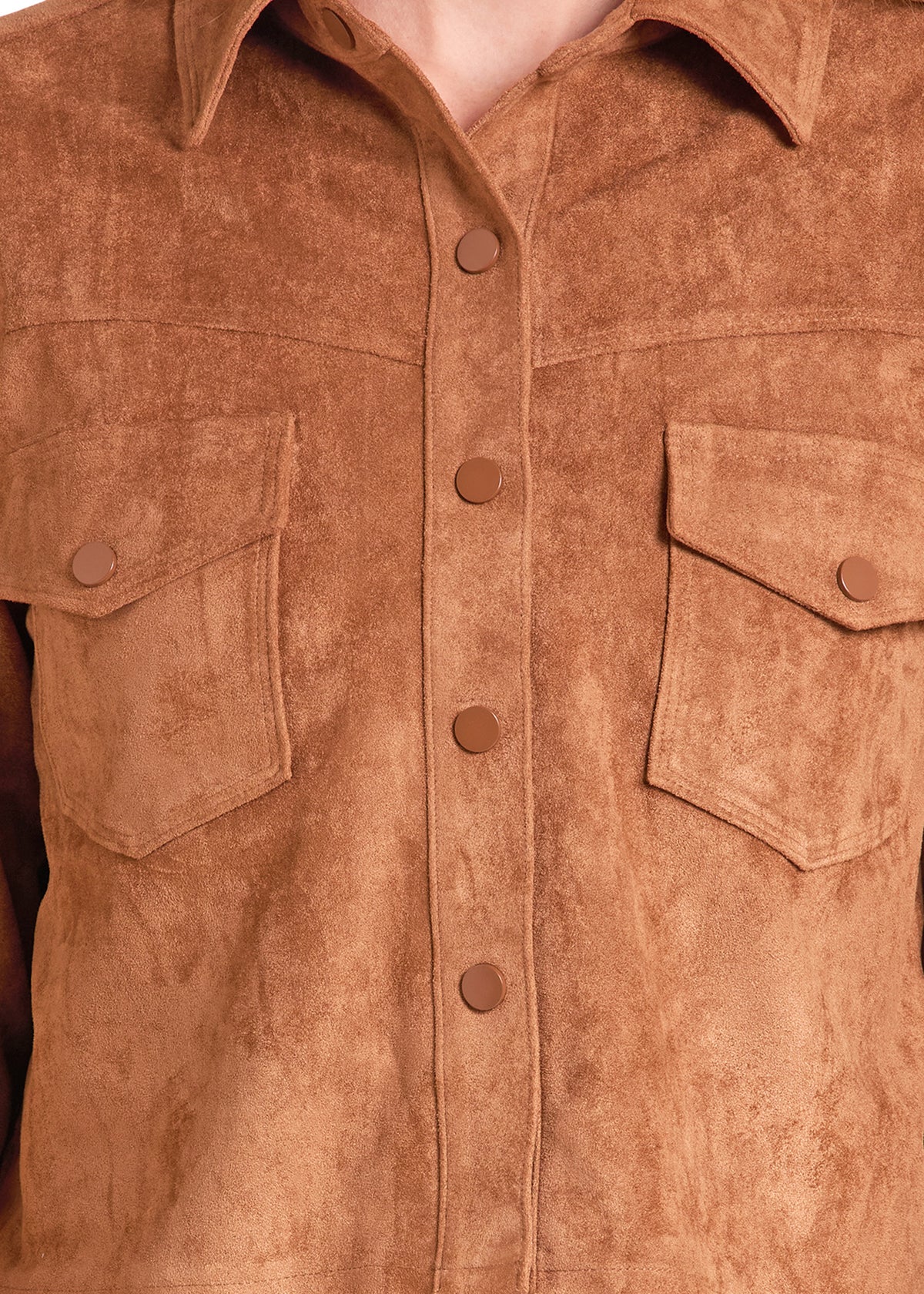 Close-up of a brown suede or faux-suede button-front shirt jacket with two chest flap pockets and a pointed collar.