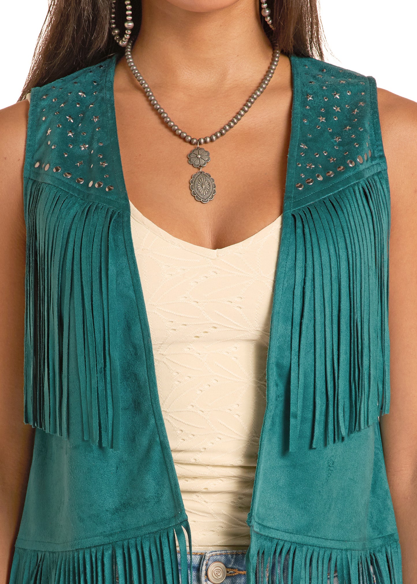 Teal suede vest with fringe details worn by a person, on a white background