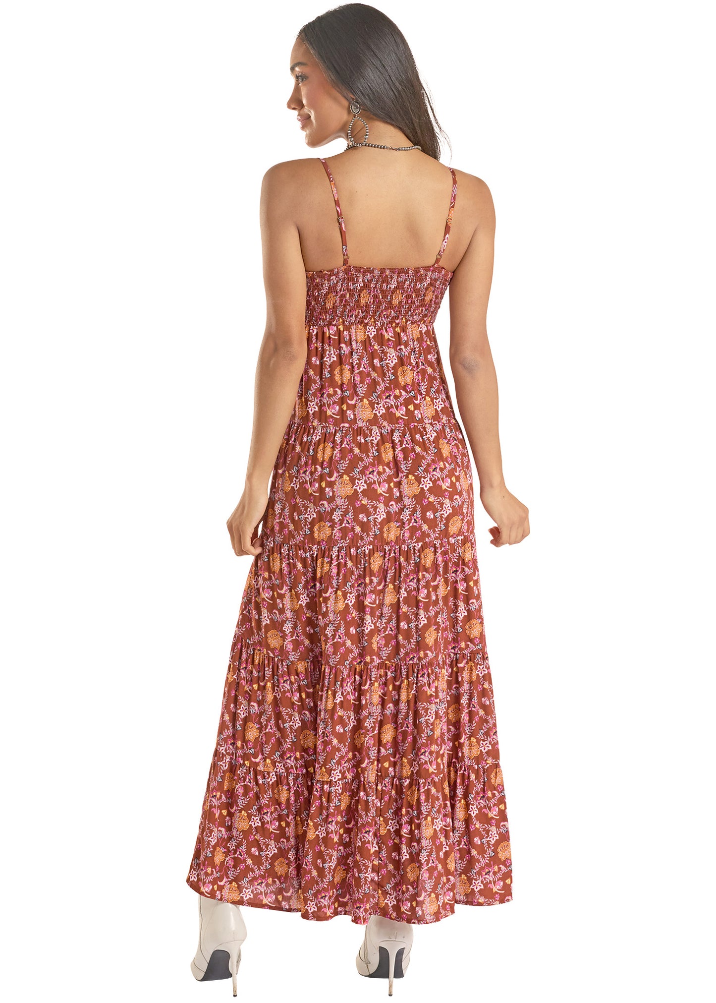 Woman wearing a floral dress on a white background