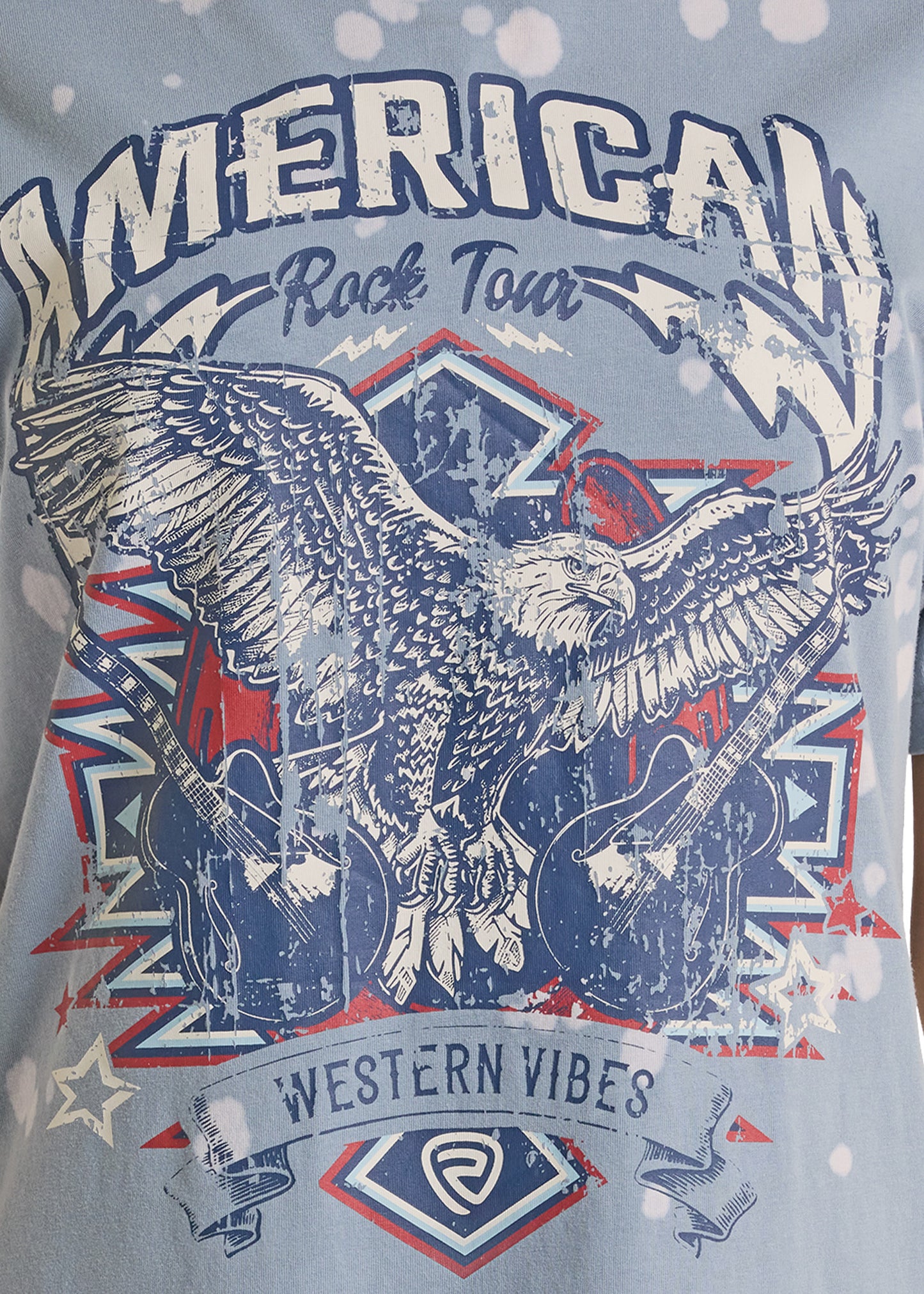T-shirt with an eagle, guitar, and 'American Rock Tour' design on a light gray background