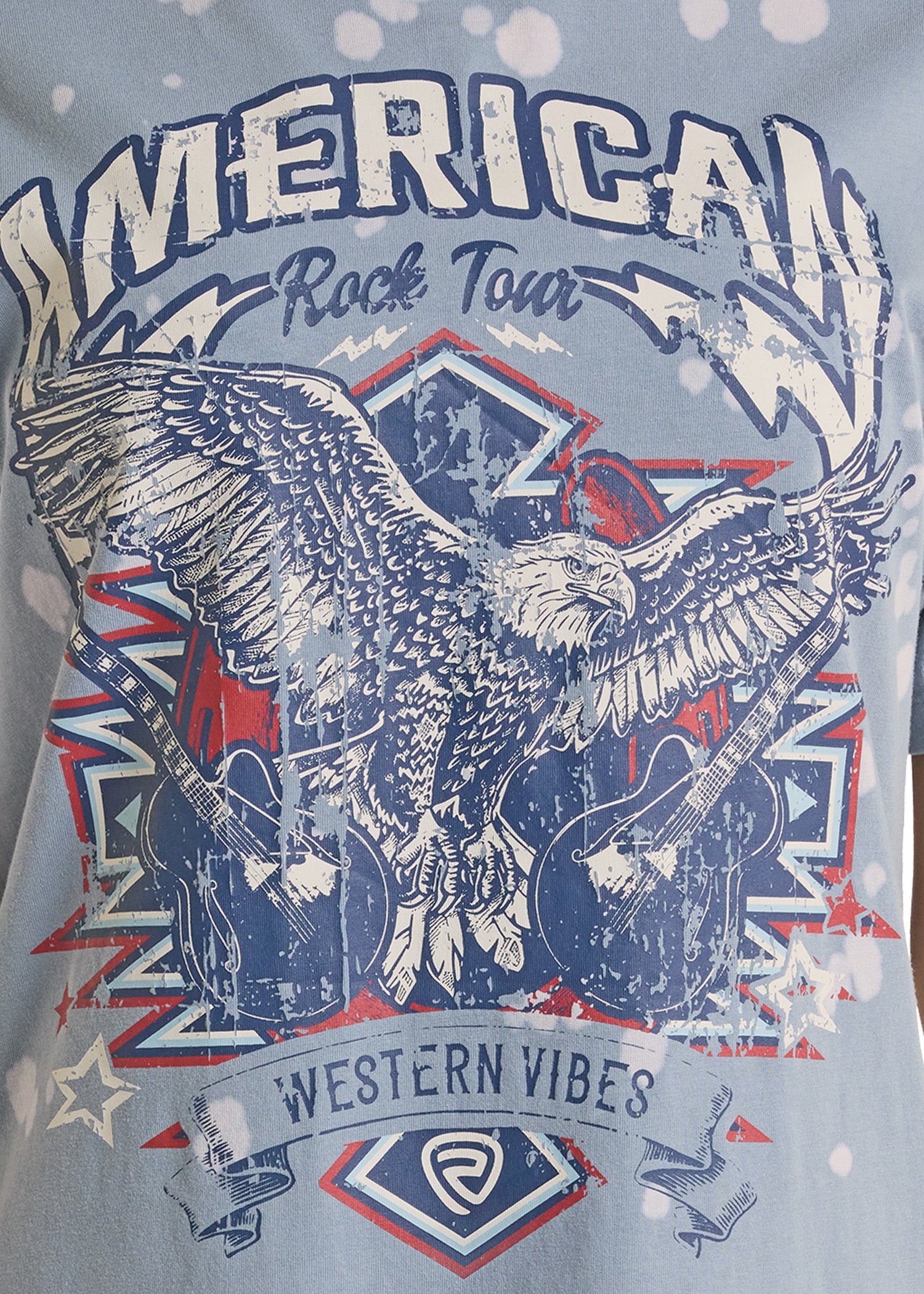 T-shirt with an eagle, guitar, and 'American Rock Tour' design on a light gray background