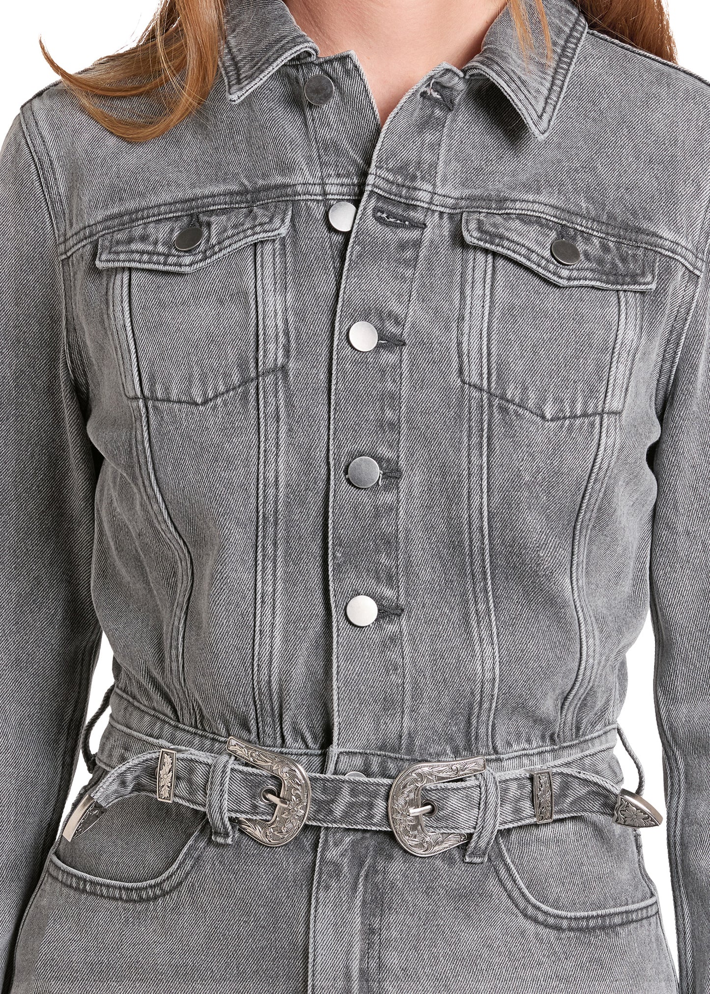 Close up of a women's western denim dress.