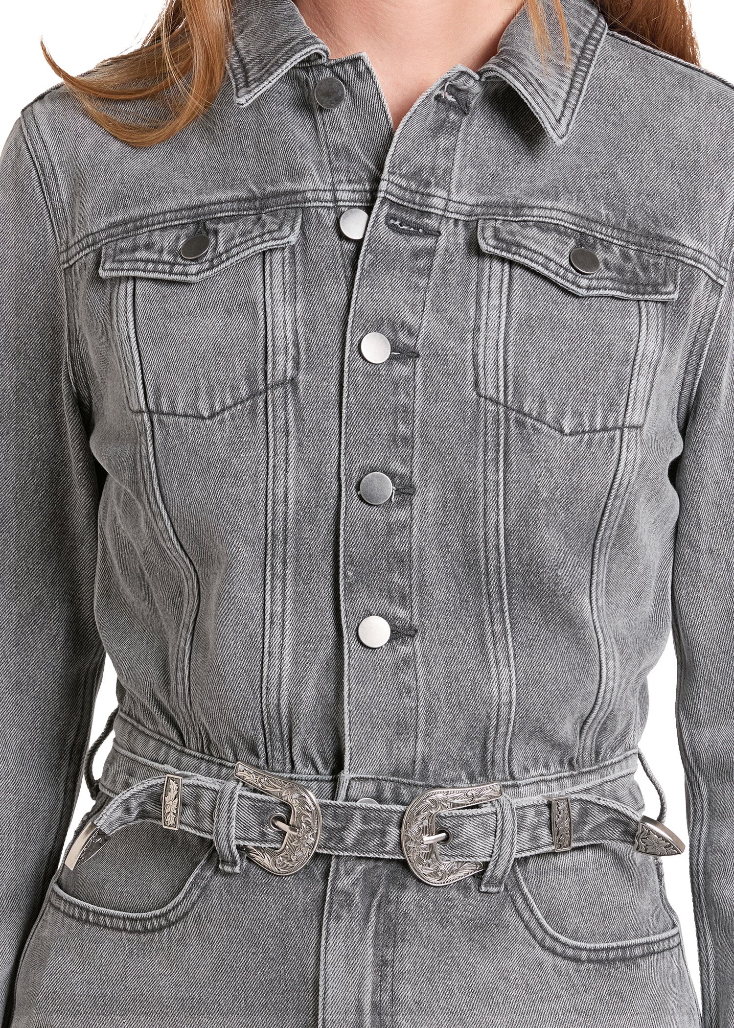 Close up of a women's western denim dress.