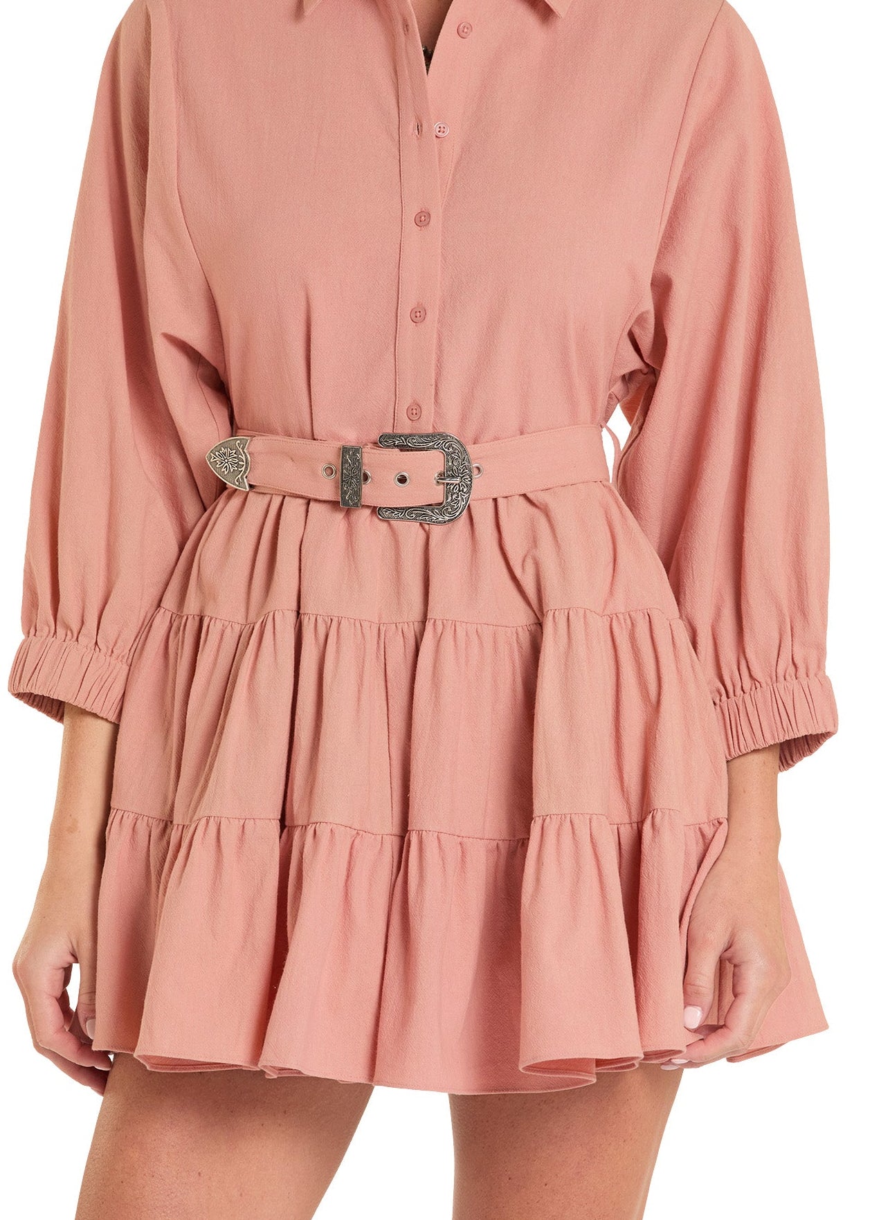 Pink dress with a belt on a white background