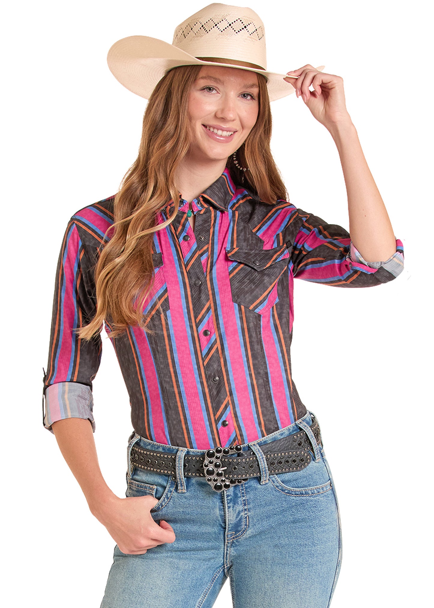 Woman wearing a colorful striped shirt, jeans, and a cowboy hat on a white background