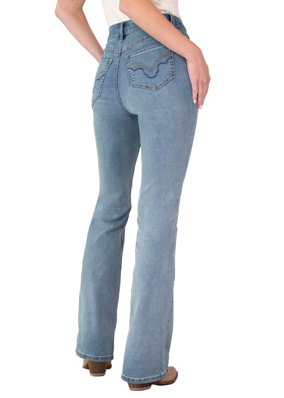A woman wearing a tan cowboy hat, white tank top, and light blue high-waisted flare jeans, shown from a back-three-quarter angle against a plain white background.