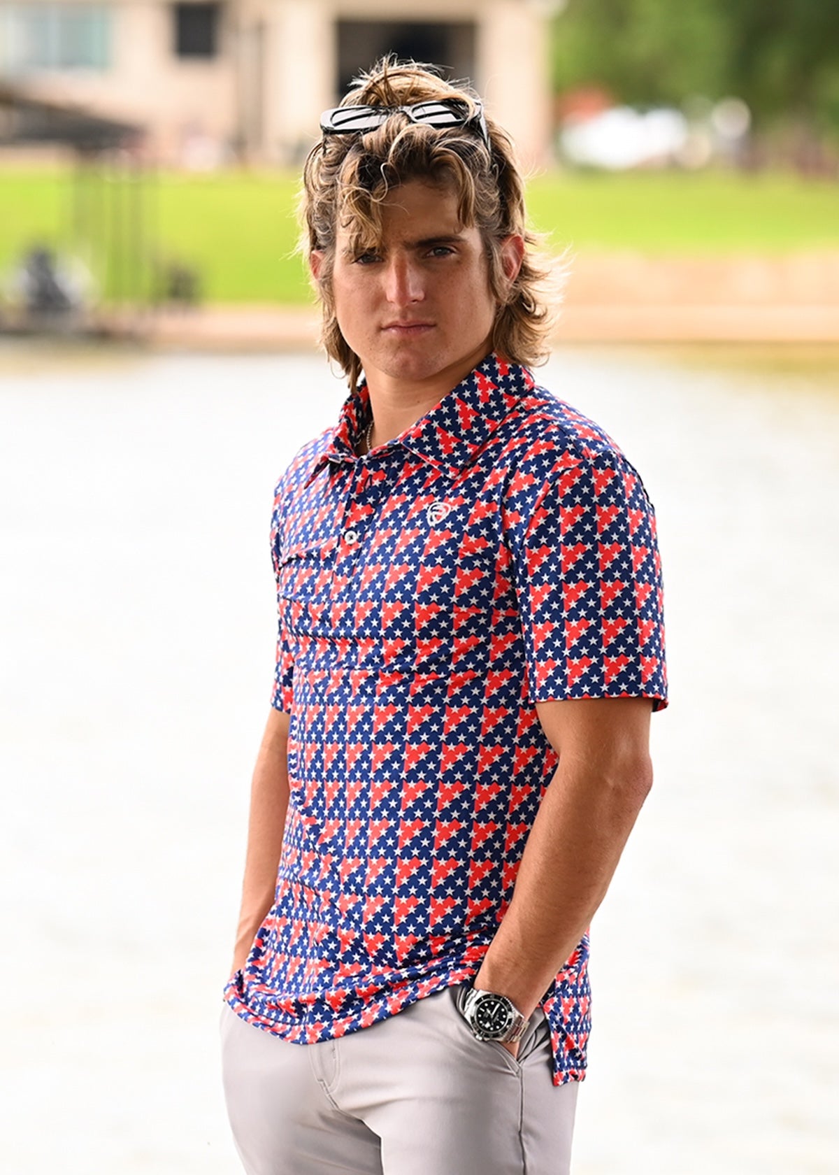 Rocker Steiner wearing a red, white and blue polo