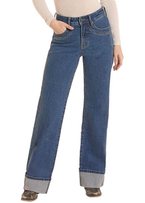 Woman wearing a wide leg cuff jean. 